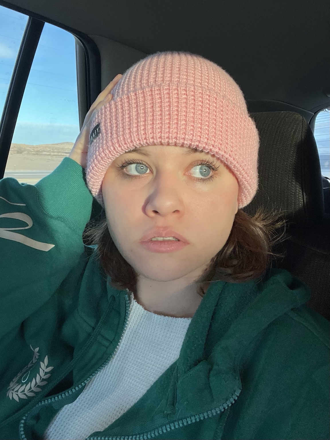 Kendall Morgan Lacy wearing a pink beanie